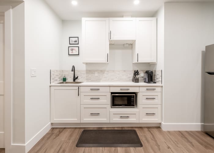 Commercial Street suite kitchen and living area